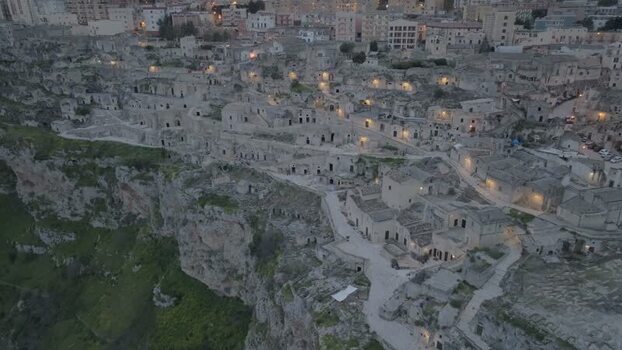 Aerial view of Sassi di Matera at dusk in Matera Italy.