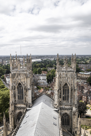 Aerial view of York Minster with its twin gothic towers and stone roof overlooking the historic city of York England United Kingdom.