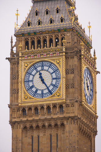 London United Kingdom 12 May 2025 View of the iconic Big Ben clock tower with its intricate gothic architecture and golden details against an overcast sky.