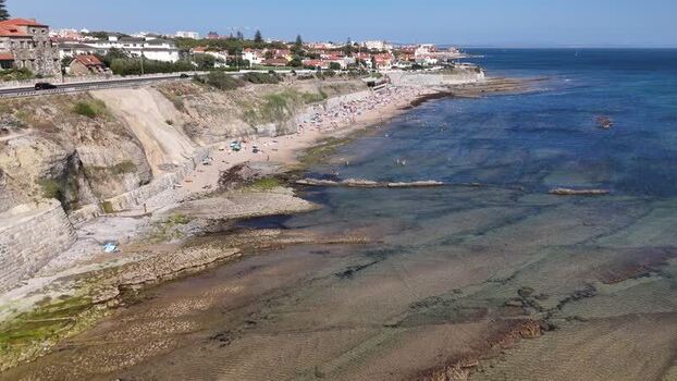 Aerial view of Praia das Avencas coastline in Cascais Portugal.