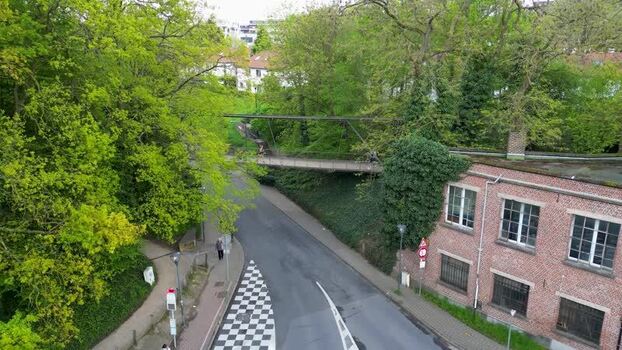 Aerial view of a pedestrian bridge over a street Belgium. Aerial view of a pedestrian bridge over a street Belgium.