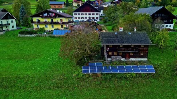 Aerial view of traditional houses and solar panels Austria.