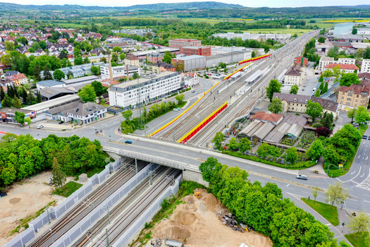 Aerial view of the Forchheim railway station and Bahnhofstrasse bridge with multiple tracks platforms and surrounding urban architecture Forchheim Bayern Germany. Aerial view of the Forchheim railway station and Bahnhofstrasse bridge with multiple tracks platforms and surrounding urban architecture Forchheim Bayern Germany.