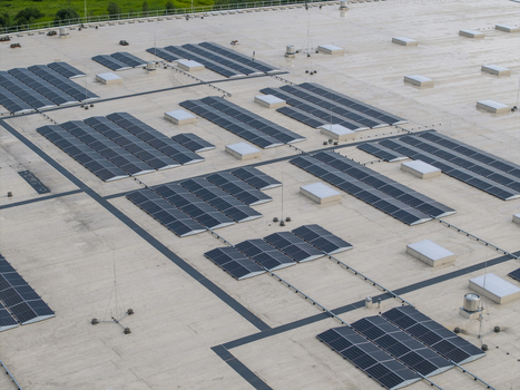 Aerial view of a logistics hub roof featuring extensive solar panel arrays ventilation units and lightning protection systems in Skawina Lesser Poland Voivode Poland. Aerial view of a logistics hub roof featuring extensive solar panel arrays ventilation units and lightning protection systems in Skawina Lesser Poland Voivode Poland.