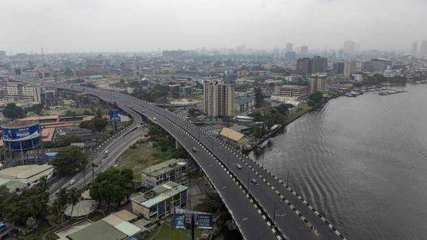 Aerial view of the bridge and urban landscape of Lagos Island in Lagos Lagos Nigeria. Aerial view of the bridge and urban landscape of Lagos Island in Lagos Lagos Nigeria.