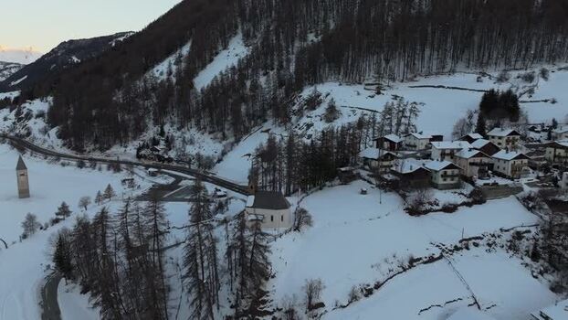 Aerial view of the sunken church tower in Graun im Vinschgau Italy. Aerial view of the sunken church tower in Graun im Vinschgau Italy.