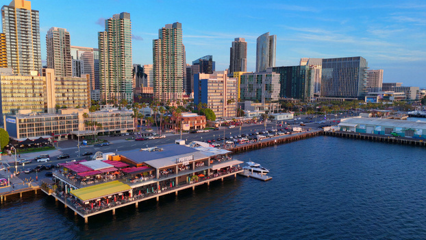 San Diego California 01 April 2026 Aerial view of Portside Pier on North Harbor Drive and North Embarcadero with the city skyline and waterfront in the background.