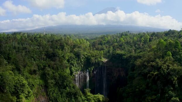 Aerial view of Grojogan Sewu Waterfall and lush jungle Indonesia. Aerial view of Grojogan Sewu Waterfall and lush jungle Indonesia.