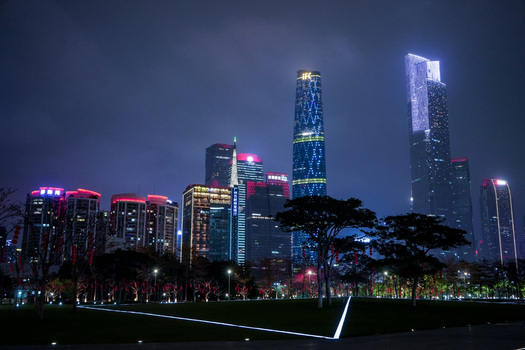 Guangzhou China 24 February 2024 View of the illuminated skyline featuring the Guangzhou International Finance Center at night with modern skyscrapers glowing against the dark sky. Guangzhou China 24 February 2024 View of the illuminated skyline featuring the Guangzhou International Finance Center at night with modern skyscrapers glowing against the dark sky.