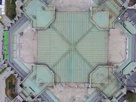 Aerial view of the geometric green metal roof of the National Palace of Culture NDK with its symmetrical structure and surrounding paved square in Sofia Sofia City Province Bulgaria. Aerial view of the geometric green metal roof of the National Palace of Culture NDK with its symmetrical structure and surrounding paved square in Sofia Sofia City Province Bulgaria.