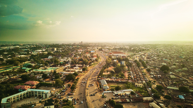 Aerial view of the urban landscape of Kaduna featuring a main road stretching through the city with buildings and residential areas in Kaduna Kaduna Nigeria. Aerial view of the urban landscape of Kaduna featuring a main road stretching through the city with buildings and residential areas in Kaduna Kaduna Nigeria.