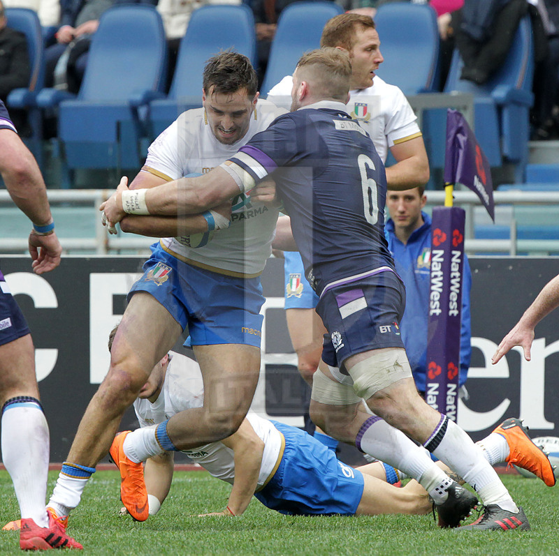 Natwest Sei Nazioni 2018, round 5, Roma stadio Olimpico 17/03/2018, Italia v Scozia, Mattia Bellini impatta su John Barclay. Foto Daniele Resini/Fotosportit
