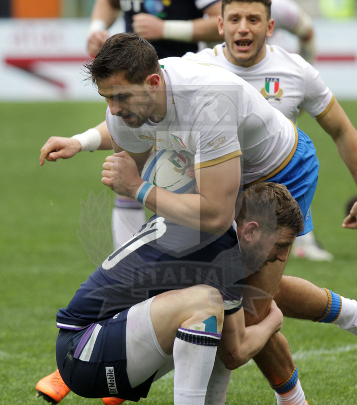 Natwest Sei Nazioni 2018, round 5, Roma stadio Olimpico 17/03/2018, Italia v Scozia, Mattia Bellini placcato da Fin Russell. Foto Daniele Resini/Fotosportit
