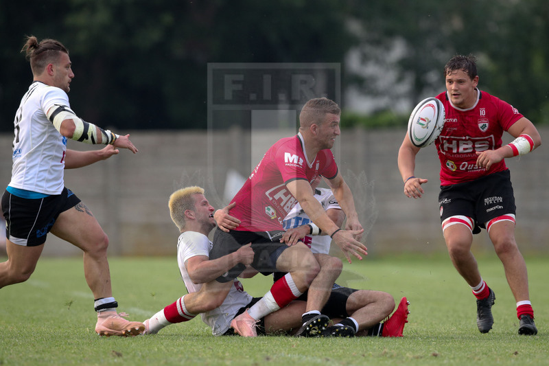Rugby, Finale Serie A, Piacenza, Stadio Beltrametti, 9/06/2019, SITAV Lyons Piacenza v HSB Rugby Colorno. Off-load di Alessandro Terzi sul placcaggio di Alessandro Via (sin) e Alessandro Via. Foto Roberto Bregani/Fotosportit.