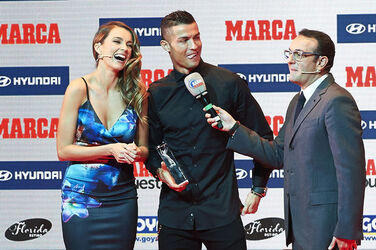 Cristiano Ronaldo jokes with a female TV presenter as he wins Alfredo di Stefano award for La Liga s best player