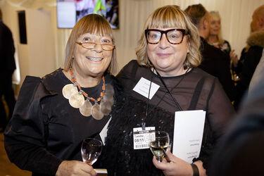 Alesha Dixon fashions a shiny turquoise jacket as she and boyfriend Azuka Ononye support Graduate Fashion Week London