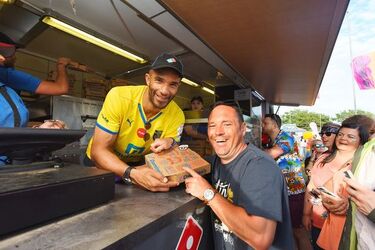 Ex England Goalie David James serves Domino s at the Isle of Wight Festival