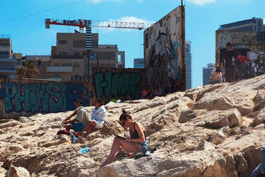 Gal Gadot seen relaxing on Dolphinarium Beach