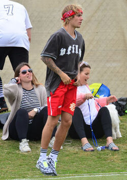Justin Bieber playing football in a park in Playa Del Rey.