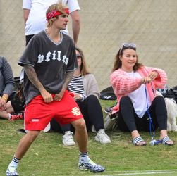 Justin Bieber playing football in a park in Playa Del Rey.