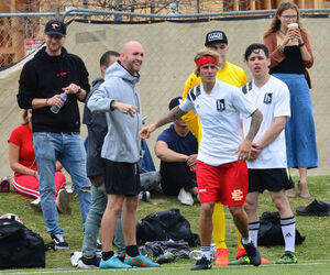 Justin Bieber playing football in a park in Playa Del Rey.