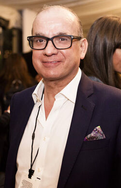 Alesha Dixon fashions a shiny turquoise jacket as she and boyfriend Azuka Ononye support Graduate Fashion Week London