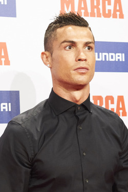 Cristiano Ronaldo jokes with a female TV presenter as he wins Alfredo di Stefano award for La Liga s best player