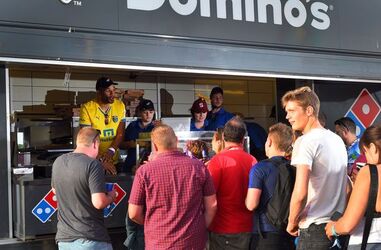 Ex England Goalie David James serves Domino s at the Isle of Wight Festival