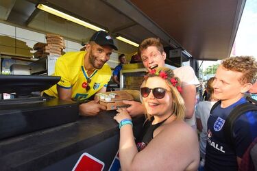 Ex England Goalie David James serves Domino s at the Isle of Wight Festival
