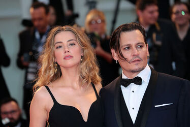 Actor Johnny Depp and actress Amber Heard at the 72nd Venice Film Festival