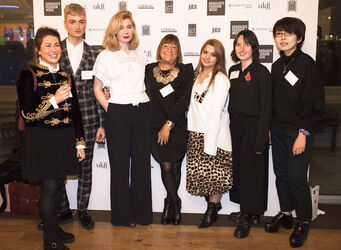 Alesha Dixon fashions a shiny turquoise jacket as she and boyfriend Azuka Ononye support Graduate Fashion Week London