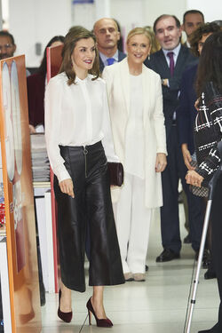 Queen Letizia of Spain fashions Uterq&uuml;e trousers a Hugo Boss shirt and Coollook earrings Madrid