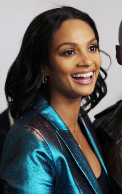 Alesha Dixon fashions a shiny turquoise jacket as she and boyfriend Azuka Ononye support Graduate Fashion Week London