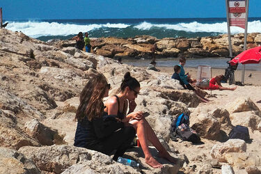 Gal Gadot seen relaxing on Dolphinarium Beach