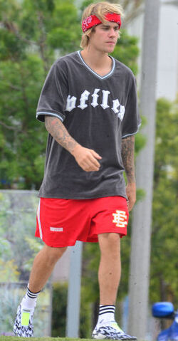 Justin Bieber playing football in a park in Playa Del Rey.