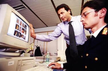 ROLANDO RUSSO CAPO DIVISIONE INVESTIGATIVA DELLA POLIZIA DELLE COMUNICAZIONI PEDOFILIA COMPUTER PROSTITUZIONE INTERNET