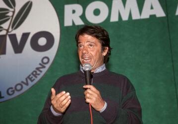 PUCCIO CORONA GIORNALISTA