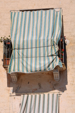 Il PORTO DI FAVIGNANA in Sicilia visioni panoramiche o particolari. Fotografie di Giulio Azzarello &copy;2014.
