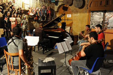 GIACOMO CUTICCHIO e il suo ensemble musicale. Fotografie di Giulio Azzarello &copy;2014.