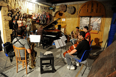 GIACOMO CUTICCHIO e il suo ensemble musicale. Fotografie di Giulio Azzarello &copy;2014.