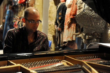 GIACOMO CUTICCHIO e il suo ensemble musicale. Fotografie di Giulio Azzarello &copy;2014.