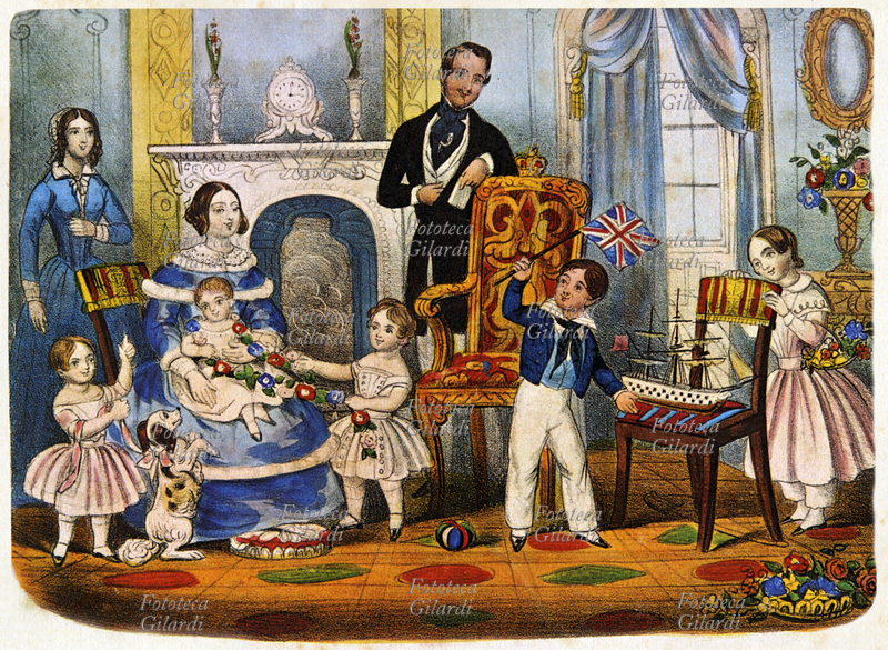 VITTORIA del Regno Unito (24 maggio 1819 – 22 gennaio 1901). La sovrana con il principe consorte Alberto di Sassonia-Coburgo-Gotha (26 agosto 1819 – 14 dicembre 1861), gli infanti reali e il cagnolino nella reale stanza dei giochi. Sulla destra la primogenita Vittoria, futura regina di Prussia e imperatrice consorte di Germania, ed Edoardo futuro Edoardo VII. Litografia a colori, Gran Bretagna 1847.