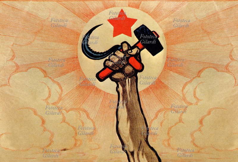 USSR symbols of communism: the hand wielding the hammer and sickle, in the background the rising sun and the red star \