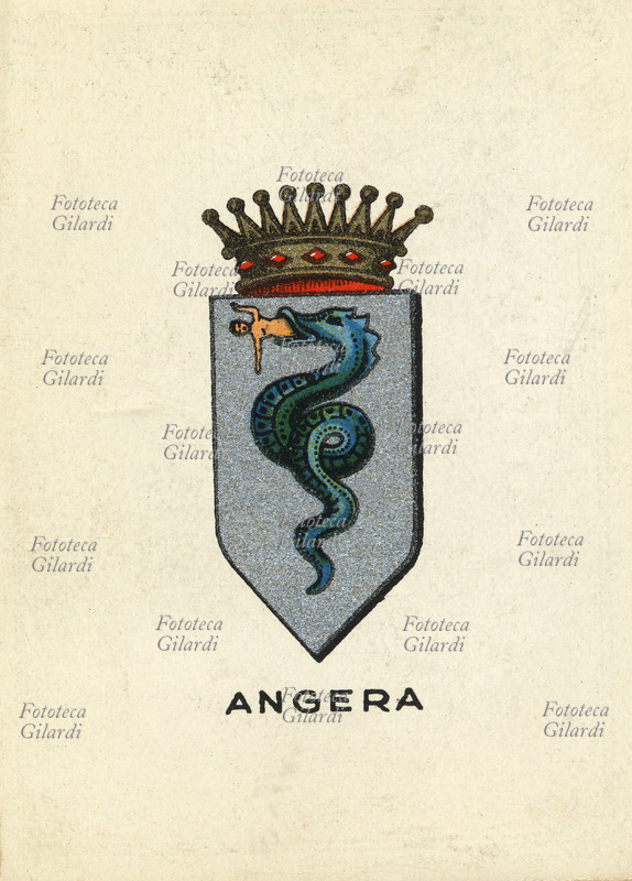 ANGERA (Varese) Il paese è sito sulla riva sinistra del lago Maggiore, ai piedi di tre colli formanti un semicerchio di cui il primo a ovest è coronato dalla Rocca o Castello Borromeo. Scudo d\