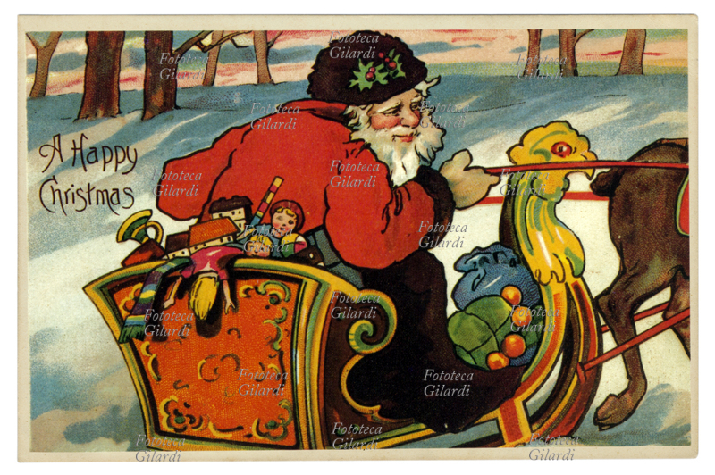 NATALE Babbo Natale alla guida della slitta colma di giocattoli. Cartolina augurale natalizia dei primi del XX secolo