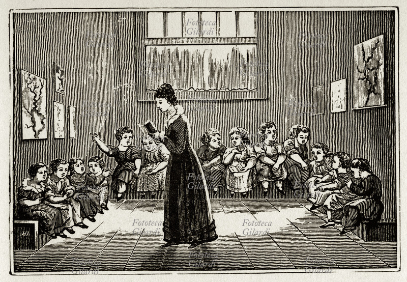 SCUOLA Scena di insegnamento in una delle prime \