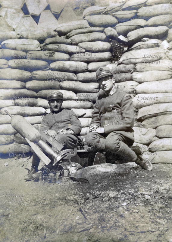 FIRST WORLD WAR Soldiers with mortar from 58 in a blockhouse of Serravalle; the emplacement is protect by a wall of sandbags, May 1917
