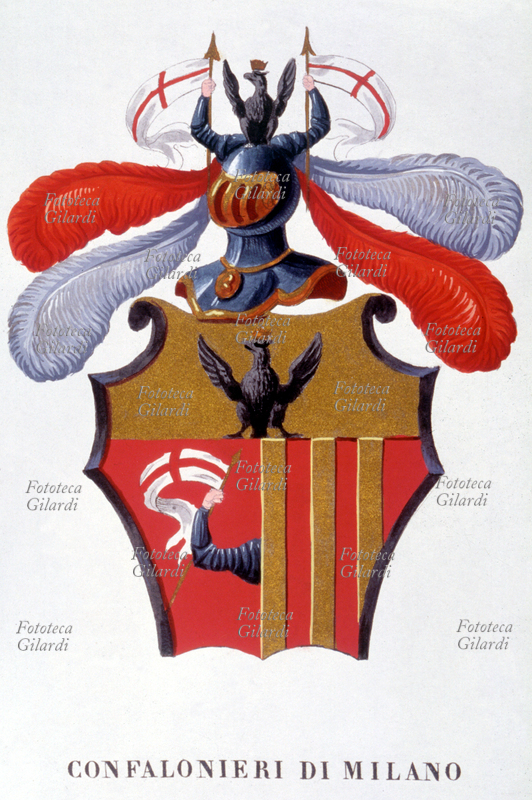 STEMMA Confalonieri di Milano. Scudo partito con braccio in armatura reggente il gonfalone crociato, bande verticali oro e rosso; sopra, aquila nera su oro. Sul cimiero due braccia in armatura reggenti gonfaloni crociati. Da \