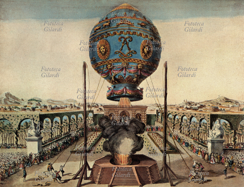 AVIAZIONE Esperimenti dei fratelli Montgolfier nel giardino del signor di Reveillon. Stampa colorata, 1783