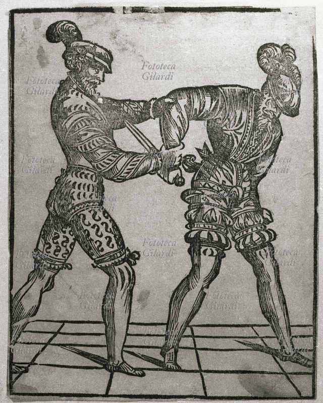 SCHERMA presa nona, una delle posizioni nella scherma con daghetta (spada corta) . Xilografia da: Opera nova de Achille Marozzo, mastro generale de l\